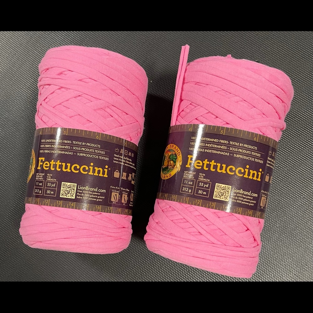 Two skeins Lion brand Fettuccini T-shirt yarn pink